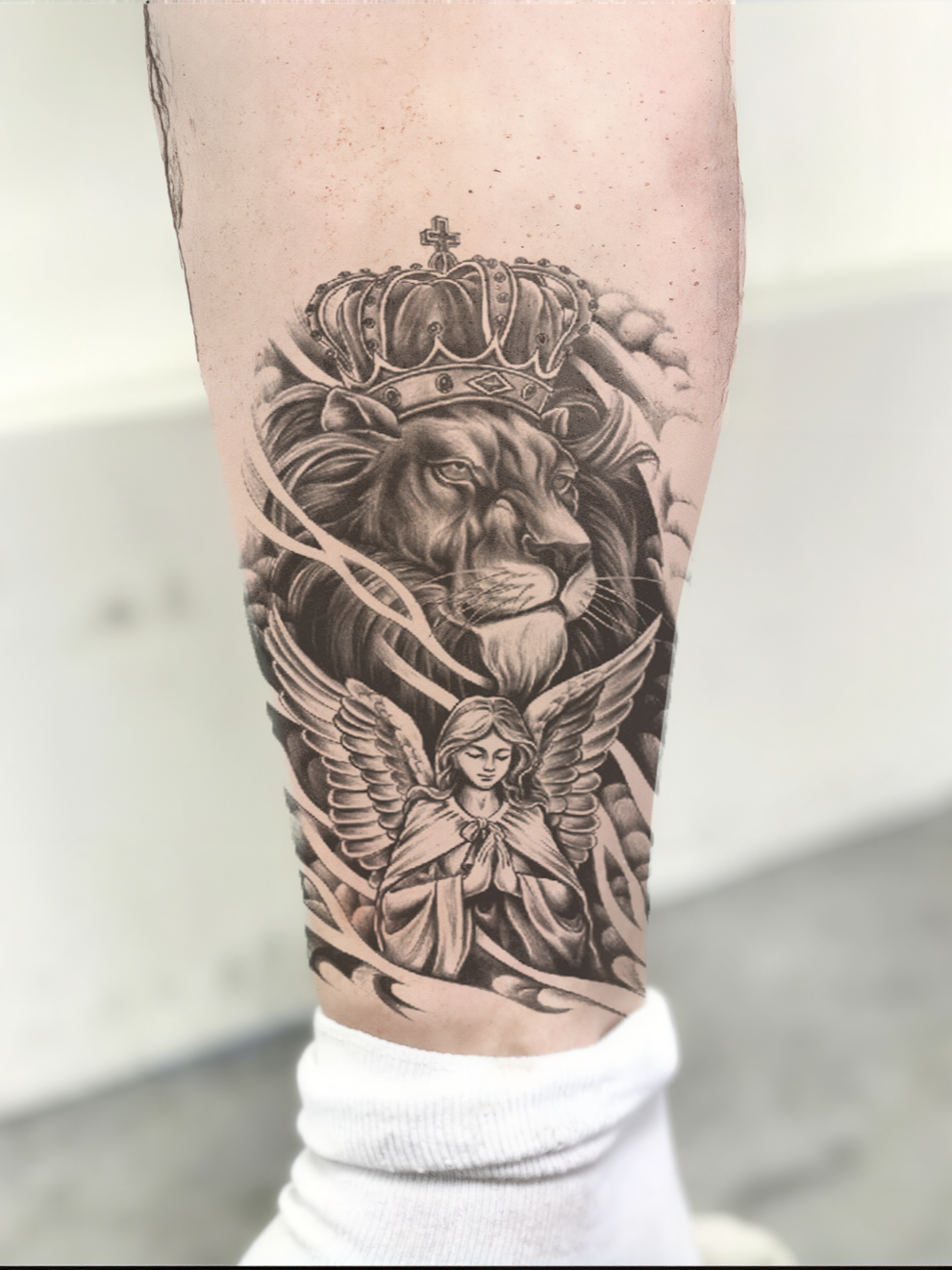 Angel and the Lion Semi Permanent Tattoo